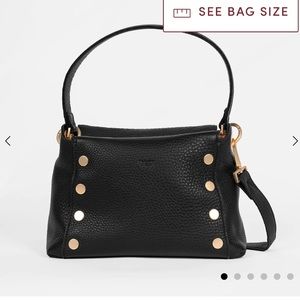 Used Bryant Hammitt Real Leather black with gold and red accent.